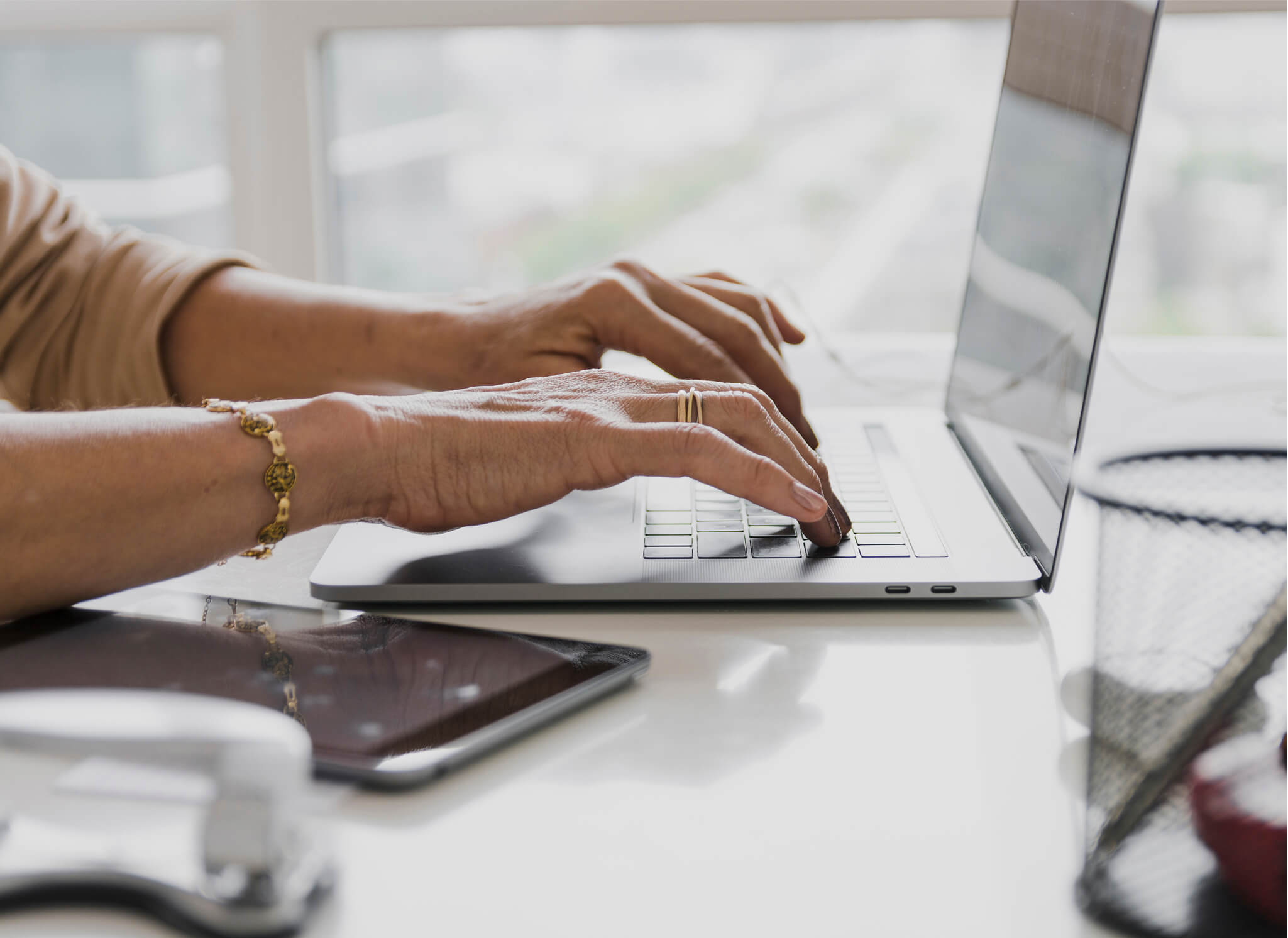 close-up-shot-person-typing-laptop 1